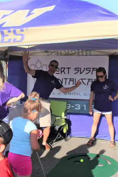 Team at Port Susan Dental Care community service booth at National Night Out
