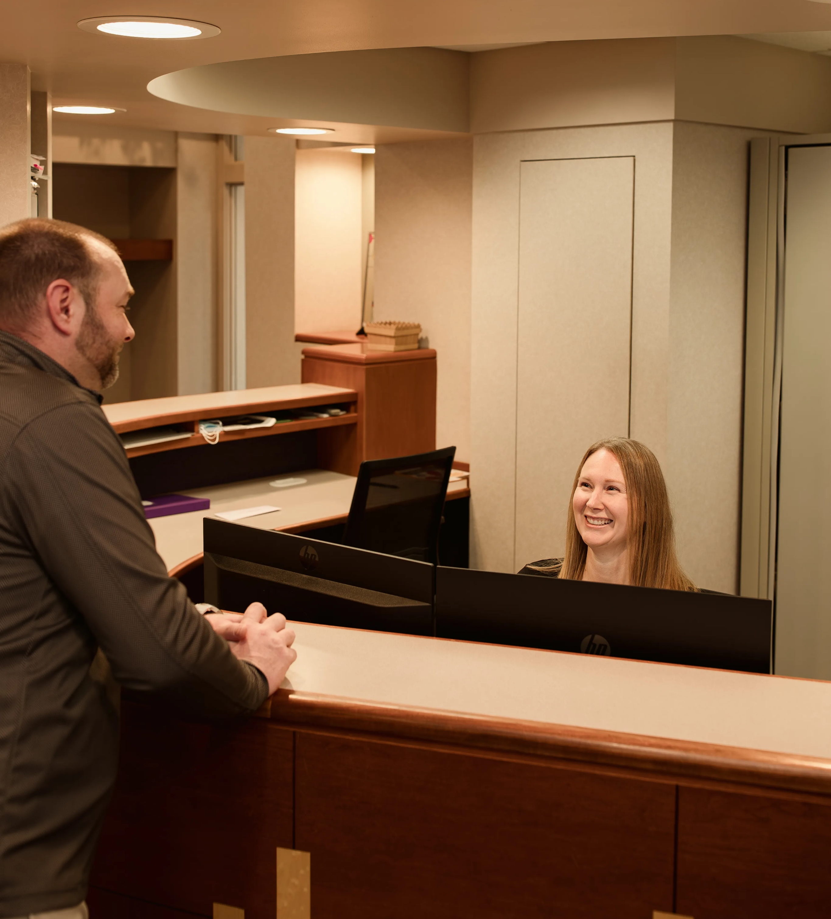 Team member talking with patient at Port Susan Dental Care