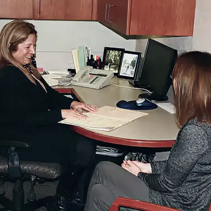 Team member talking with patient at Port Susan Dental Care