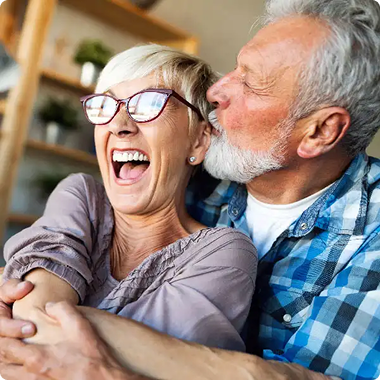 Happy senior couple smiling